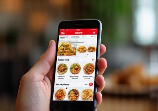 Customer browsing menu on mobile phone
